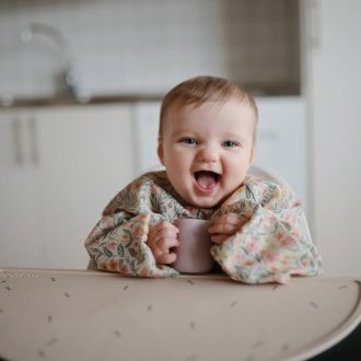 Mushie | Long Sleeve Bib, Pastel Blooms